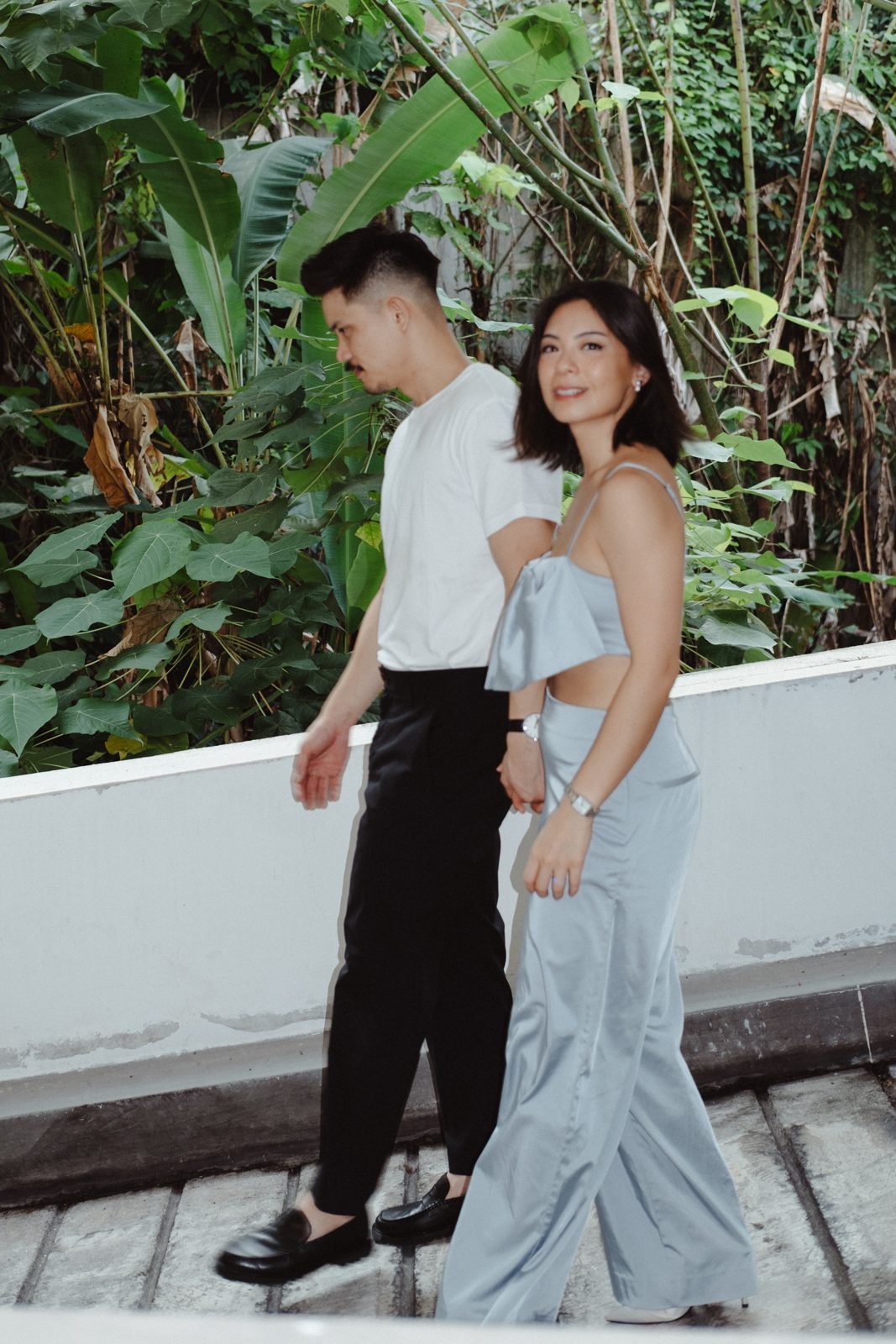 Couple posing on a rooftop