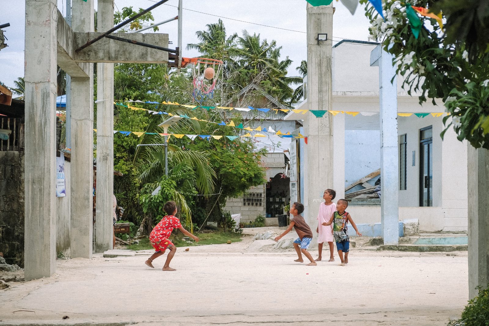 Kids playing on a quiet concrete street